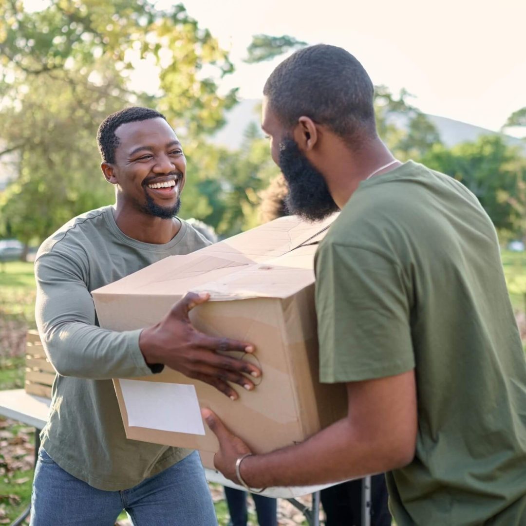 black-man-charity-and-holding-box-in-park-of-dona-2023-02-07-21-57-49-utc-Cropped.jpg